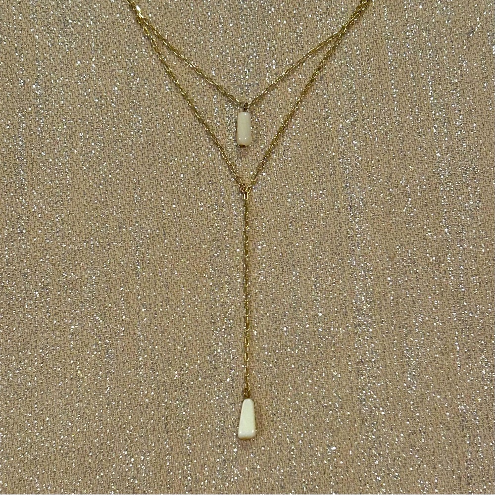 Gold tone double strand pearl pendant necklace